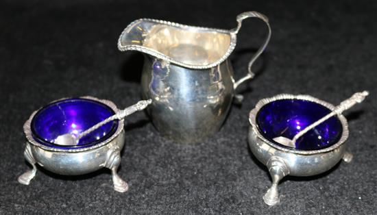 Pair of George III silver salts and a George V silver cream jug